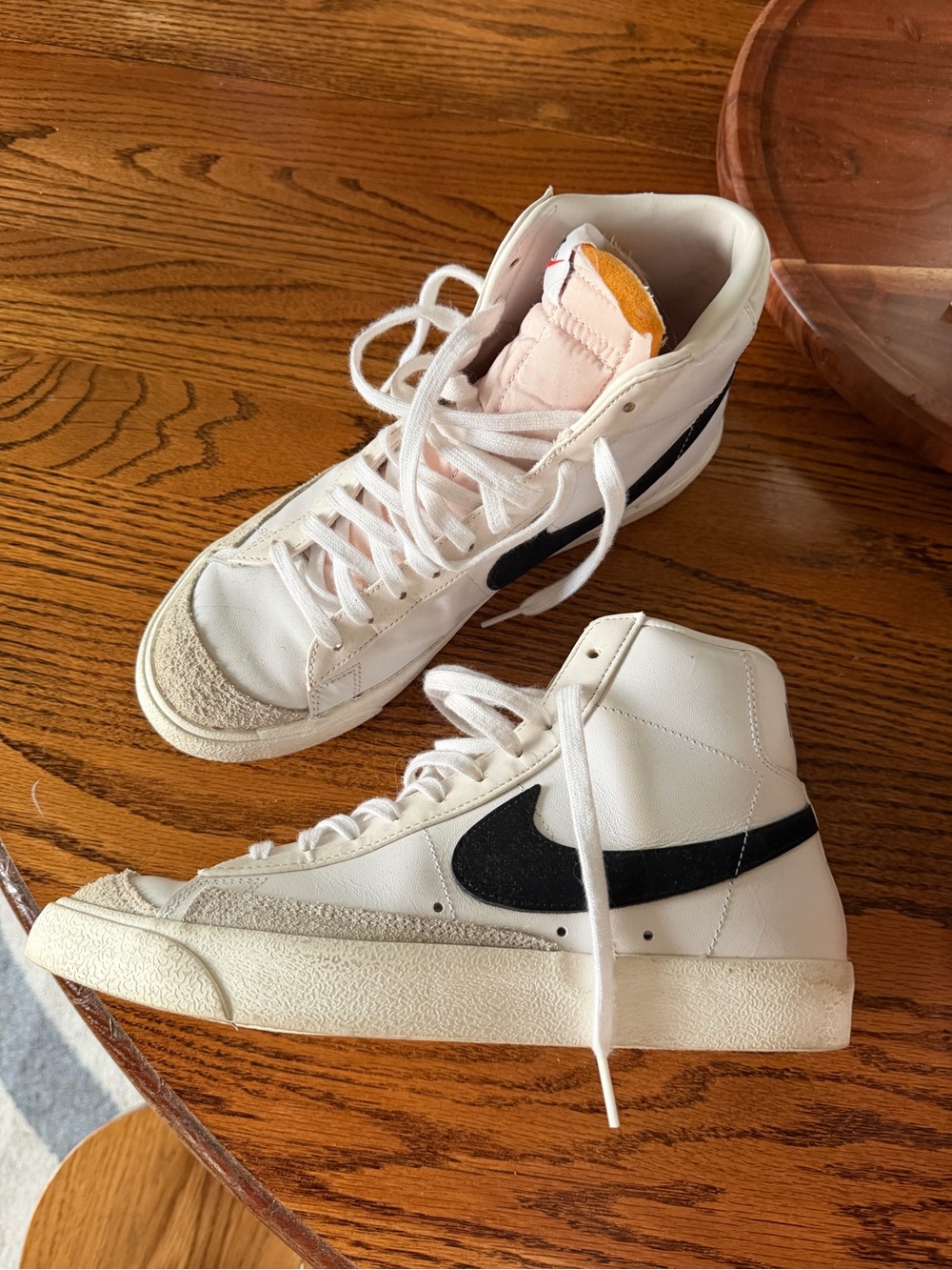 Nike High-Top Sneakers in White with Black Swoosh